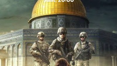 Antakya’da kent merkezinde enkaz yığınları arasında İsrail’i kınama eylemi düzenleniyor.