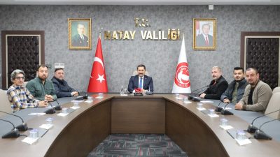 Hatay Valisi Mustafa Masatlı, Hatay Basın Cemiyeti Başkanı Hikmet Otuzbir
