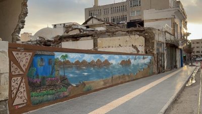 Hatay’ın İskenderun ilçesinde meydana gelen depremin ardından yıkılan binaların bulunduğu
