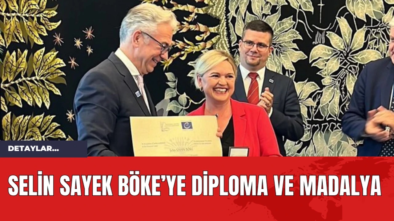 Böke’ye AKPM Onursal Üyelik ve Madalya