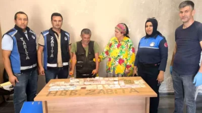 Hatay'da, zabıta ekipleri topladıkları paraları başka birine veren engelli dilenci