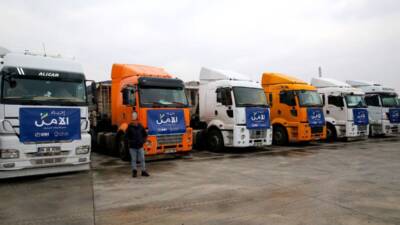 Hatay'dan, İHH ve Katar Yardım Kuruluşu işbirliğiyle hazırlanan 24 tırlık