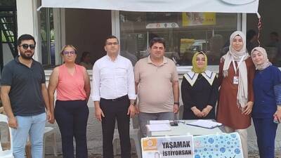 Hatay’ın Kumlu ilçesinde düzenlenen sağlık etkinliğinde vatandaşlara hem ideal kilo