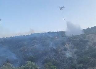 Hatay’ın Belen ilçesine bağlı Şenbük Mahallesi kırsalında çıkan orman yangını,