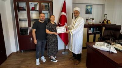 Hatay’ın Altınözü ilçesinde düzenlenen ihtida merasiminde, Moldova vatandaşı Anna, kelime-i