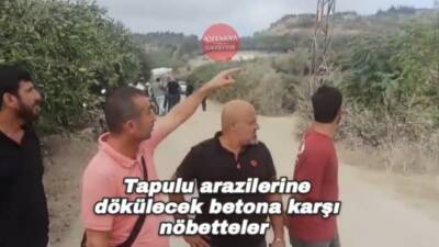   Hatay’ın Samandağ ilçesi Kurtderesi Mahallesi’nde vatandaşlar, tapulu mülklerine yönelik