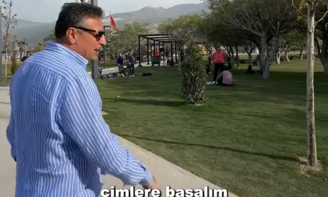   İskenderun Belediye Başkanı Dönmez, ayakkabılarını çıkarıp çimlerde yalın ayak