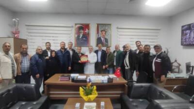 Defne Devlet Hastanesi Başhekimi Dr. Mahmut Bayrakçı, mahalle muhtarlarından oluşan