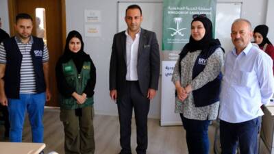 Hatay’ın Defne ilçesinde, kendilerini “Uluslararası Savaş ve Afet Mağdurları Koruma