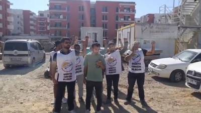 Antakya’da Emlak Konut’a bağlı şantiyede çalışan işçiler, ücretlerinin ödenmediği gerekçesiyle